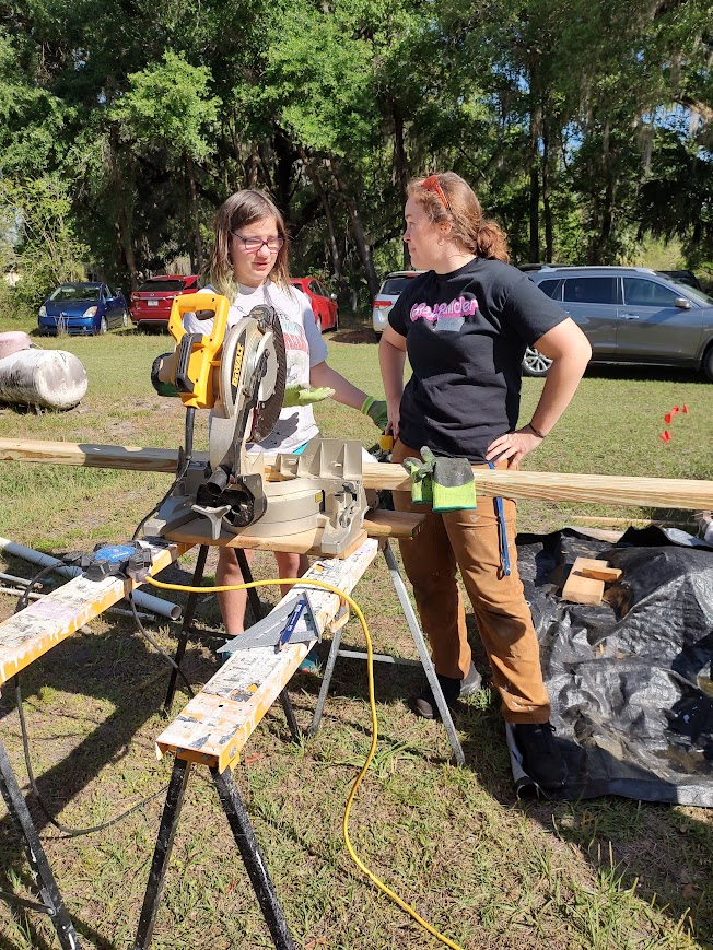 Working with Rebuilding Together on restoring a community member's historic home.