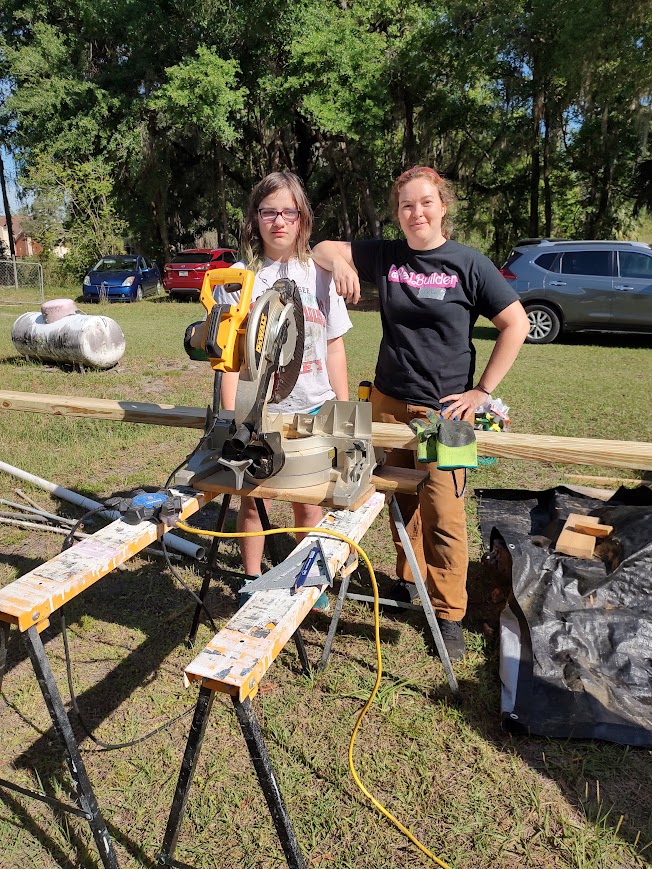 Working with Rebuilding Together on restoring a community member's historic home.